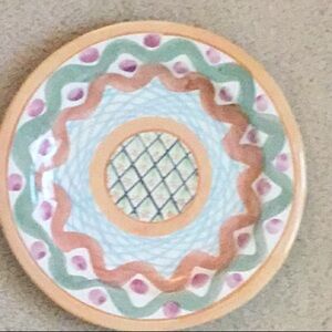 Retired Mackenzie Childs dinner plate.